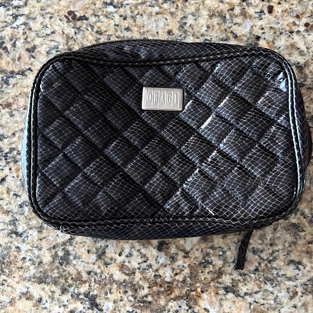 OBAGI Exclusive gorgeous cosmetic/travel organizer | Multiple pockets | 7” x 9”